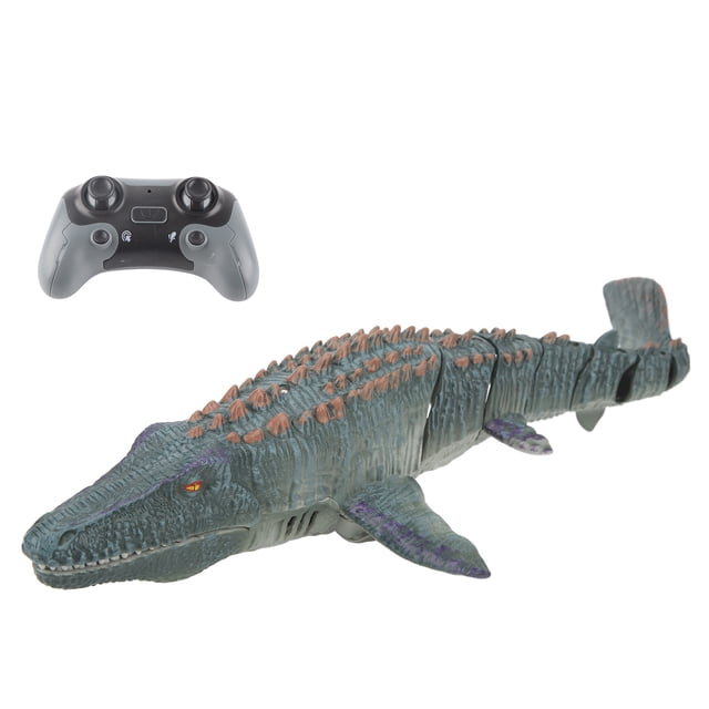 juguete de monstruo marino antiguo, juguete de dinosaurio Mosasaurus remoto flotante con control remoto 2.4GHz: vista 3/4 frontal de Mosasaurus de plástico gris verdoso con crestas color óxido, cola articulada y aletas, control remoto gris arriba a la izquierda; flota, avanza/retrocede, gira izquierda/derecha, rocía agua y tiene demostración automática; también suele usarse para juegos de escena y exhibición acuática.