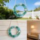thumbnail image 5 of Decoración costera hecha a mano con corona de vidrio marino - Flor de vidrio azul 25cm • Colgante de pared con temática de playa • Regalo de decoración para el hogar de estilo náutico oceánico, 5 of 5
