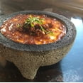 thumbnail image 3 of Mexican Molcajete With Tortilla Basket By Verve Culture, Basalt Volcanic Stone Mortar And Pestle, Rough Surfaced Kitchenware For Mixing And Grinding, Oven Safe, 7 Diameter Grinding Bowl, 3 of 5