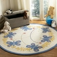 thumbnail image 2 of SAFAVIEH Kids Edweena Butterflies Area Rug, Ivory/Blue, 8' x 10', 2 of 7