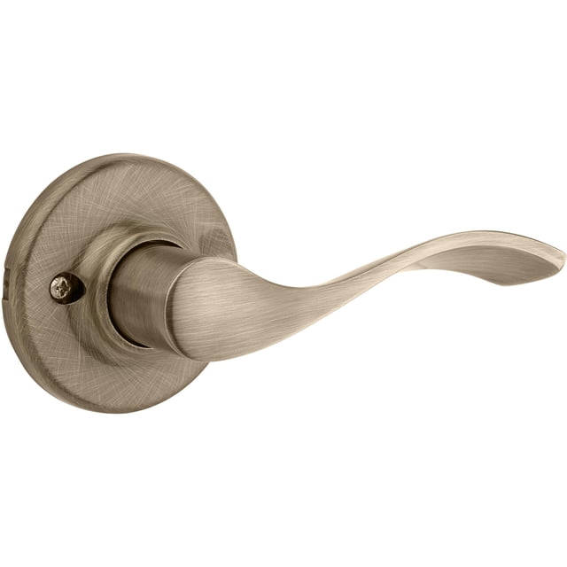 Tirador de puerta Kwikset Balboa Dummy de latón envejecido que no gira