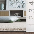 thumbnail image 4 of SAFAVIEH Penelope Braden Solid Shag Area Rug, Beige, 6'7" x 6'7" Round, 4 of 10