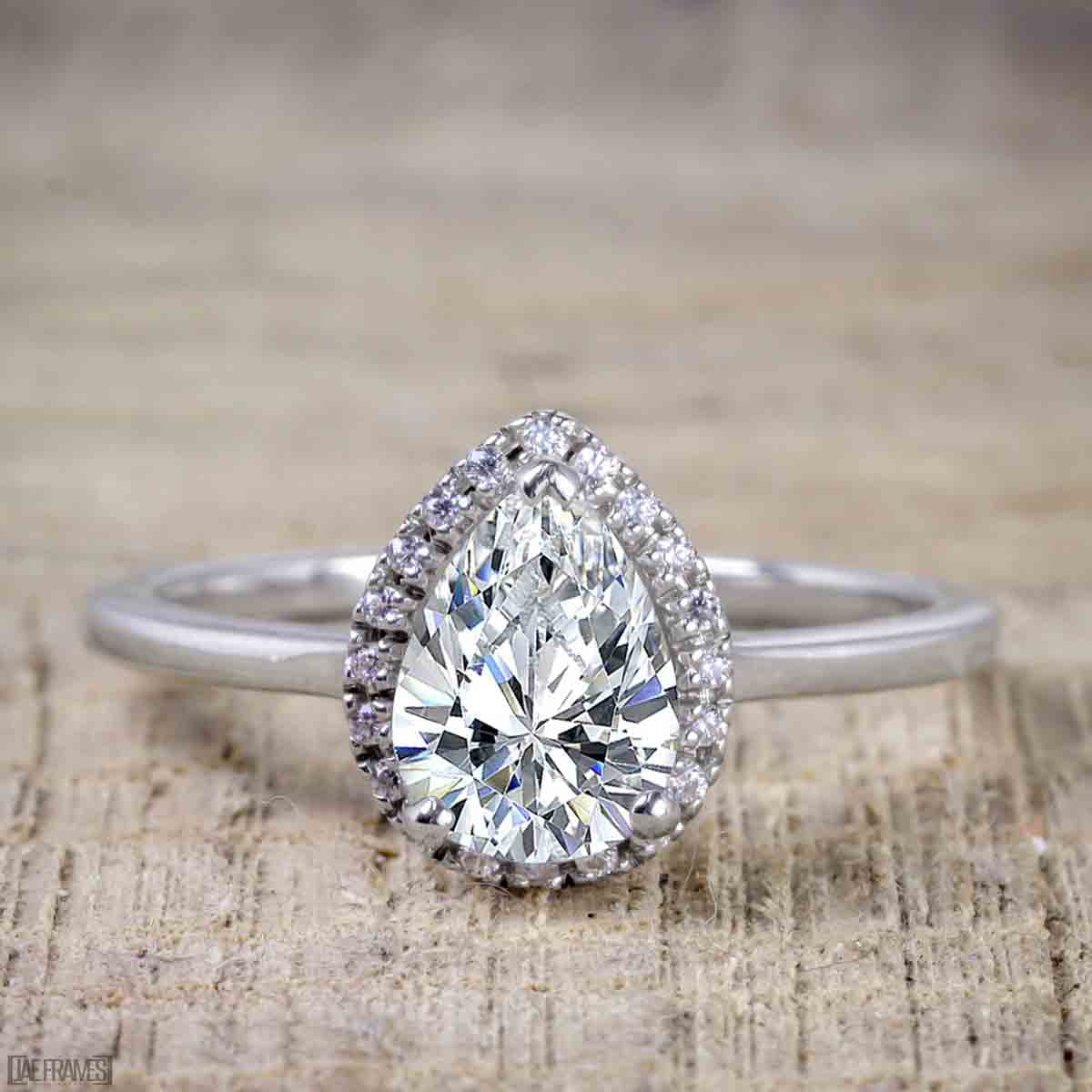 Affordable 2 Carat Pear cut Moissanite and Diamond Antique