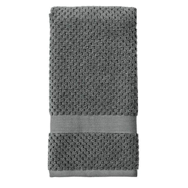 Better Homes & Gardens Signature Soft Popcorn Texture gray towel featuring a raised textured pattern and smooth decorative band.