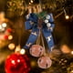 thumbnail image 1 of Adornos Navideños de Campanas de Hierro con Lazo, Cuerda de Yute y Detalles de Bayas: Adornos Colgantes para Árboles, Coronas y Decoraciones Festivas., 1 of 5