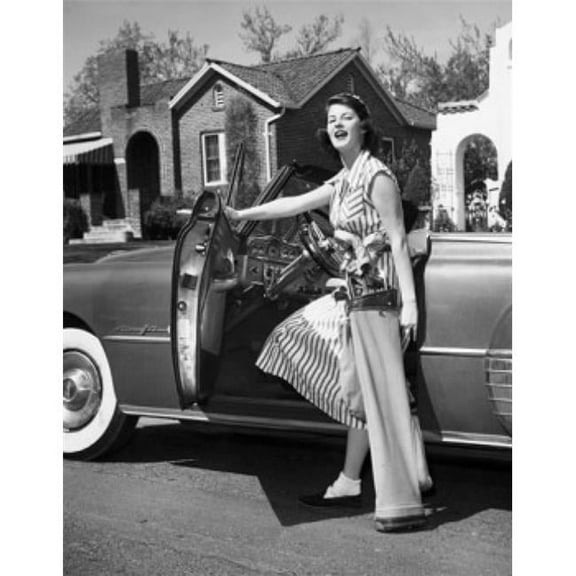Posterazzi SAL2554647 Young Woman Opening the Door of a Car Poster Print - 18 x 24 in.