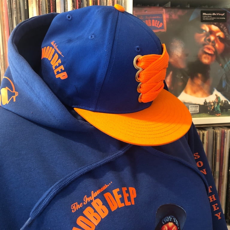 Mobb Deep hoodie. Blue “The Infamous” hoodie with orange logo and