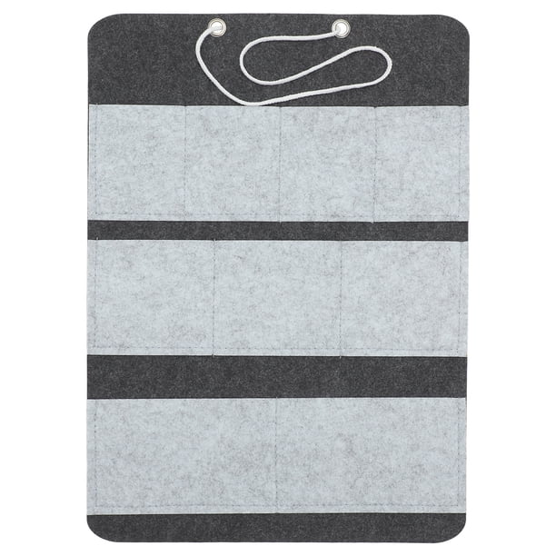 Bolsa organizadora de almacenamiento colgante con múltiples bolsillos para colgar en la pared o sobre la puerta.
