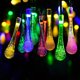 thumbnail image 1 of Nuevo tipo de luces solares de cadena, 8 modos de luz de cadena multicolor, iluminación decorativa LED para exteriores para jardín y patio, energía solar impermeable de cuatro colores - 5 metros 20 lú, 1 of 5