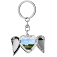 thumbnail image 1 of Fotografia de zonas verdes parque Llavero de alas de ángel en forma de corazón, 1 of 3