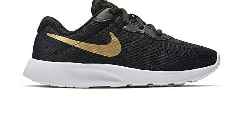 Nike tanjun outlet gold