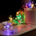 thumbnail image 4 of Cadena de luz Irfora Luces de cadena de flores con energía solar 7 m / 22,97 pies 50 piezas Flores de cerezo LED de colores Luz de hadas Decoraciones para exteriores Iluminación para árboles de Navida Irfora Cadena de luz, 4 of 7