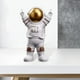 thumbnail image 5 of Estatua de astronauta, figura decorativa para habitación de niños, escultura en miniatura de astronauta, espacio exterior, juguetes educativos de aprendizaje preescolar divertidos Oro 15x10x25CM, 5 of 9