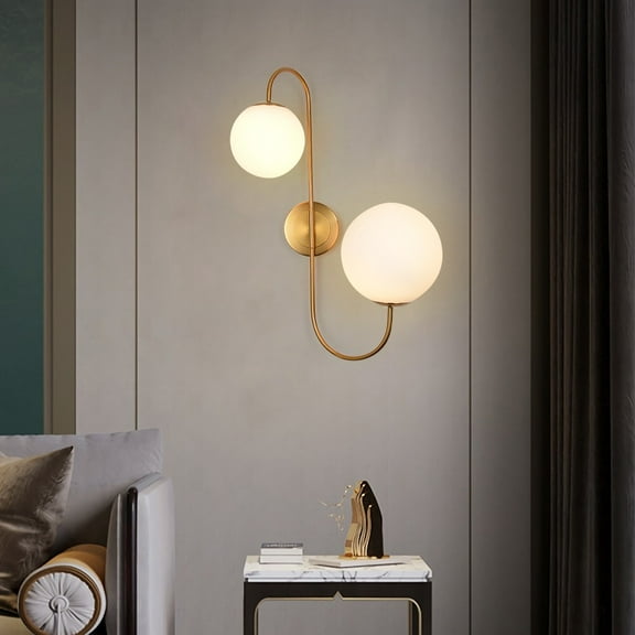 Modern 2-Light Wall Sconce with White Globe Shades in Aged Brass Finish