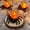 Orange, variant on Halloween LED Dripping Candle with Spider Figurine, Flameless Tealight Decor with Glowing Eyes and Flickering Flame for Spooky Tabletop Haunted House Party Ornament