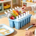 thumbnail image 1 of Juego de moldes de silicona para paletas heladas de 12 cavidades con palitos – Molde para helados caseros apto para alimentos, 1 of 6