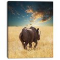 thumbnail image 2 of Giant Rhino under Cloudy Sky - Extra Large African Canvas Art Print, 2 of 3