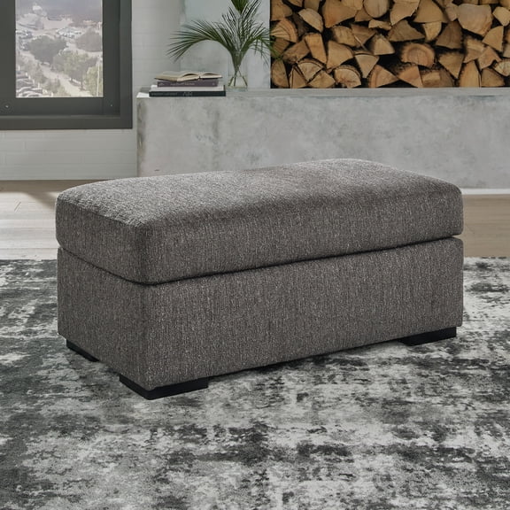 Signature Design by Ashley Gardiner Contemporary Firmly Cushioned Polyester Upholstery Ottoman with Exposed Faux Wood Finish Feet, Dark Gray