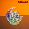 thumbnail image 5 of Rotating acrylic sculpture of a baby elephant sleeping on a crescent moon with vibrant colors and exquisite details against a white background, 5 of 8