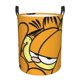 thumbnail image 1 of Cesta para ropa sucia GarField redonda de una sola capa, duradera, de tela Oxford, impermeable, portátil, plegable, para baño, bolsa de almacenamiento de ropa con asa pequeña., 1 of 7