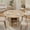 Natural wood color, variant on Space-Saving 47'' Modern Black Round Dining Table for 4-6 – Kitchen & Dining Room Table with 2-Tier Storage Shelf, Sliding Door, Fluted Pedestal – Ideal for Small Spaces – Black