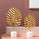 thumbnail image 3 of Luz nórdica de lujo de hierro dorado, adornos de hojas traseras de tortuga, sala de estar, gabinete de vino, porche, decoración de escritorio, muebles artesanales, Tuba dorada, 3 of 5