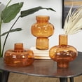thumbnail image 3 of DecMode 12", 10", 7"H Round Orange Glass Vase with Varying Shapes and Sizes, Set of 3, 3 of 17