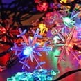 thumbnail image 2 of Morttic Solar Snowflake String Lights, 30 LED 21.3 FT Outdoor Christmas Fairy Lights, 8 Lighting Modes & Waterproof for Holiday New Year Wedding Party, Xmas Tree, Garden Decor Muticolor, 2 of 10