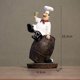 thumbnail image 2 of Figura de chef europea en miniatura, delicada estatua de cocinero, cocina de campo Sentarse en el barril de vino, 2 of 8
