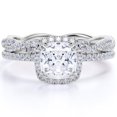 thumbnail image 1 of JeenMata Conjunto de Boda con Halo de Moissanita de Corte Cojín de 1,5 Quilates con Estilo Infinito con Banda Art Déco en Oro Blanco de 18 K sobre Plata, 1 of 6