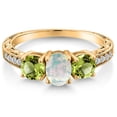 thumbnail image 3 of Gem Stone King 18K Yellow Gold Plated Silver White Simulated Opal and Green Peridot Ring for Women (2.25 Cttw, Oval Cabochon Cut, Gemstone Birthstone, Available in Size 5, 6, 7, 8, 9), 3 of 6
