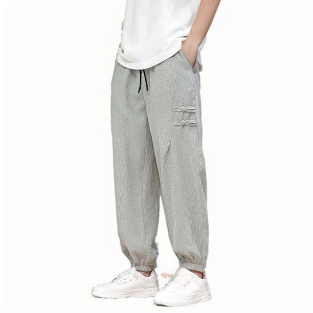 Puntoco Pantalones de hombre con bolsillos con cordón y seda de hielo de color liso con perneras atadas