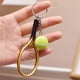 thumbnail image 1 of Herramientas y mejoras para el hogar Llavero de mini raqueta de tenis Llavero de mini raqueta de tenis simulado Regalo de equipo deportivo Un helicóptero, 1 of 2