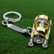 thumbnail image 4 of Llavero con colgante de tambor de carrete de pesca de aleación colgante de rueda de pesca regalo de pescador 1 ud., 4 of 6