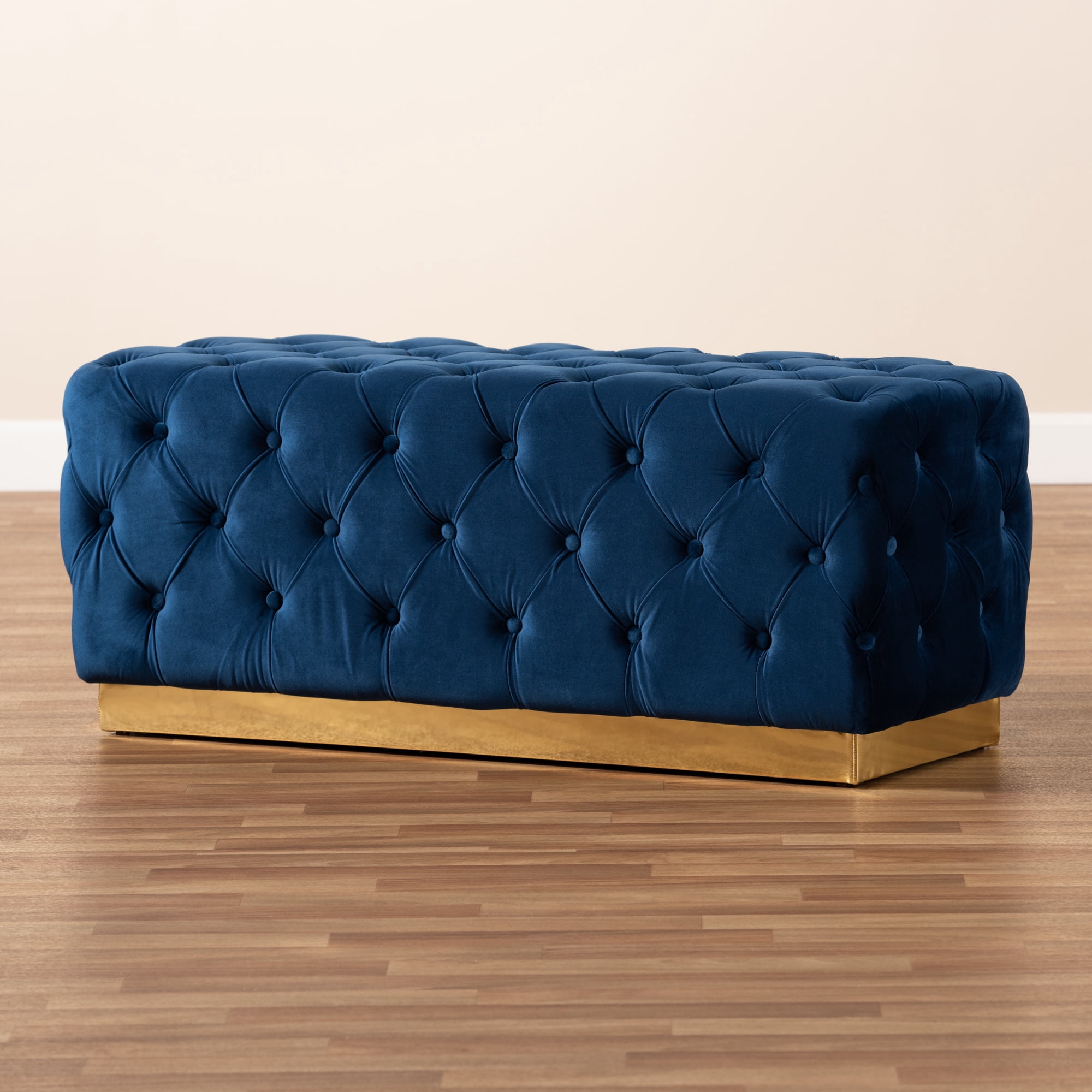 Baxton Studio Corrine Glam and Luxe Navy Blue Velvet Fabric Upholstered and Gold PU Leather Ottoman