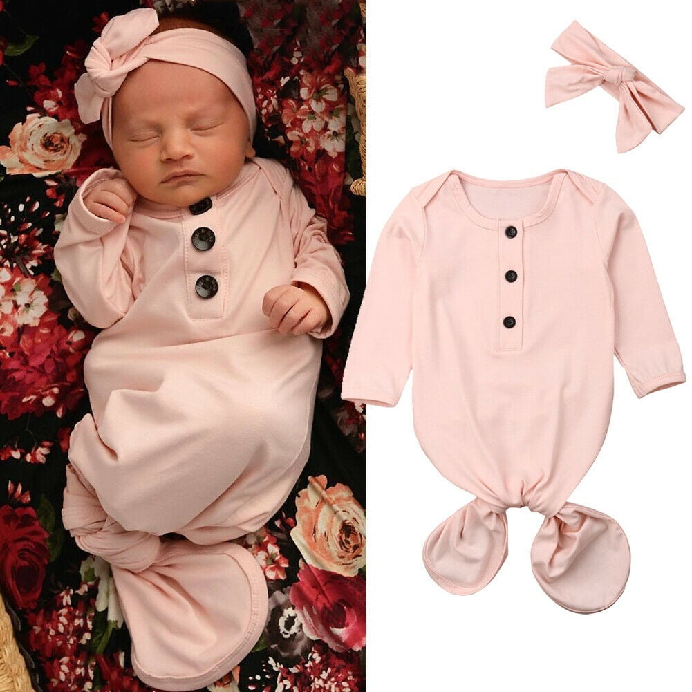cute baby girl swaddles