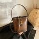 thumbnail image 2 of Bolso retro informal de gran capacidad para mujer, nueva versión coreana 2025, bolso de hombro para ir al trabajo, diseño de nicho, bolso de mano ligero de lujo, 2 of 5