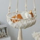 thumbnail image 1 of Cama hamaca para gatos tejida a mano | Columpio bohemio para gatos colgantes de cuerda | Cesta de gatito macramé con cascabeles | Material de algodón duradero | Muebles de interior para mascotas |, 1 of 5