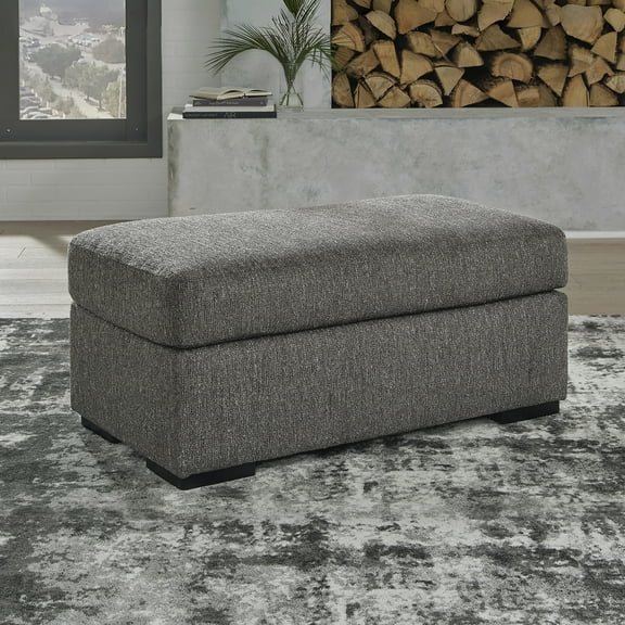 Signature Design by Ashley Gardiner Contemporary Firmly Cushioned Polyester Upholstery Ottoman with Exposed Faux Wood Finish Feet, Dark Gray