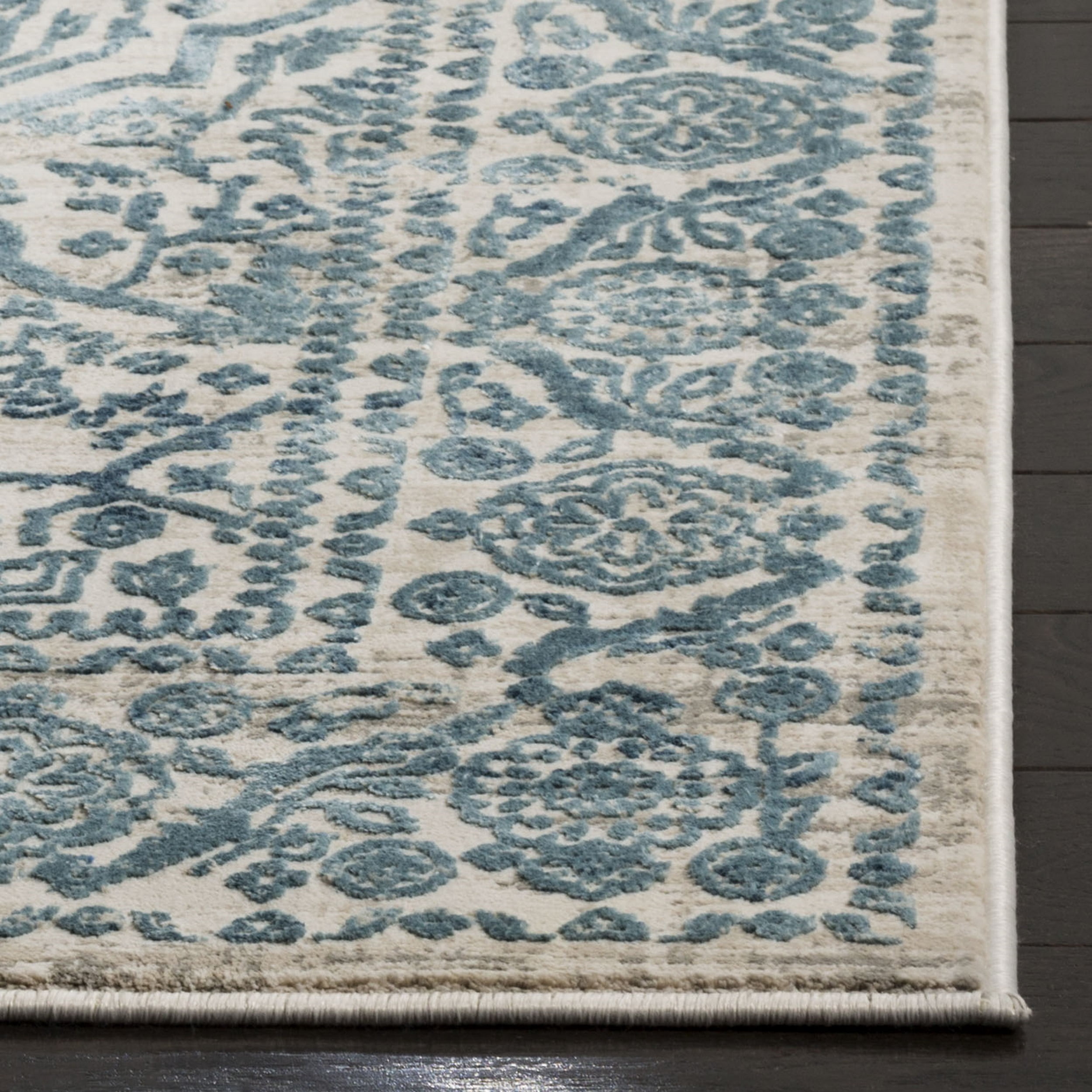 SAFAVIEH Princeton Xavier Floral Bordered Area Rug, Blue/Beige, 5'1" x 7'6"