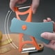 thumbnail image 5 of Pelador De Frutas Y Verduras, Herramienta De Cocina 2 En 1, Diseño Giratorio Multifuncional Con Almacenamiento, Pela Y Corta De Forma Eficiente, Utensilio Ergonómico Para El Hogar, 5 of 7