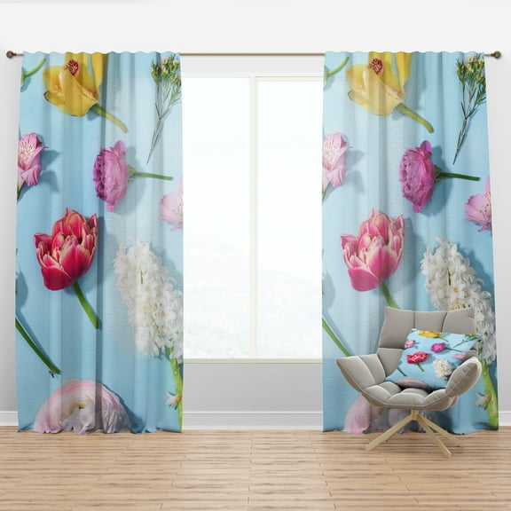 Designart 'Blooming Flowers On Blue' Floral Curtain Panel