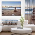 thumbnail image 1 of Design Art - Stones Balance on Sandy Beach, 1 of 3