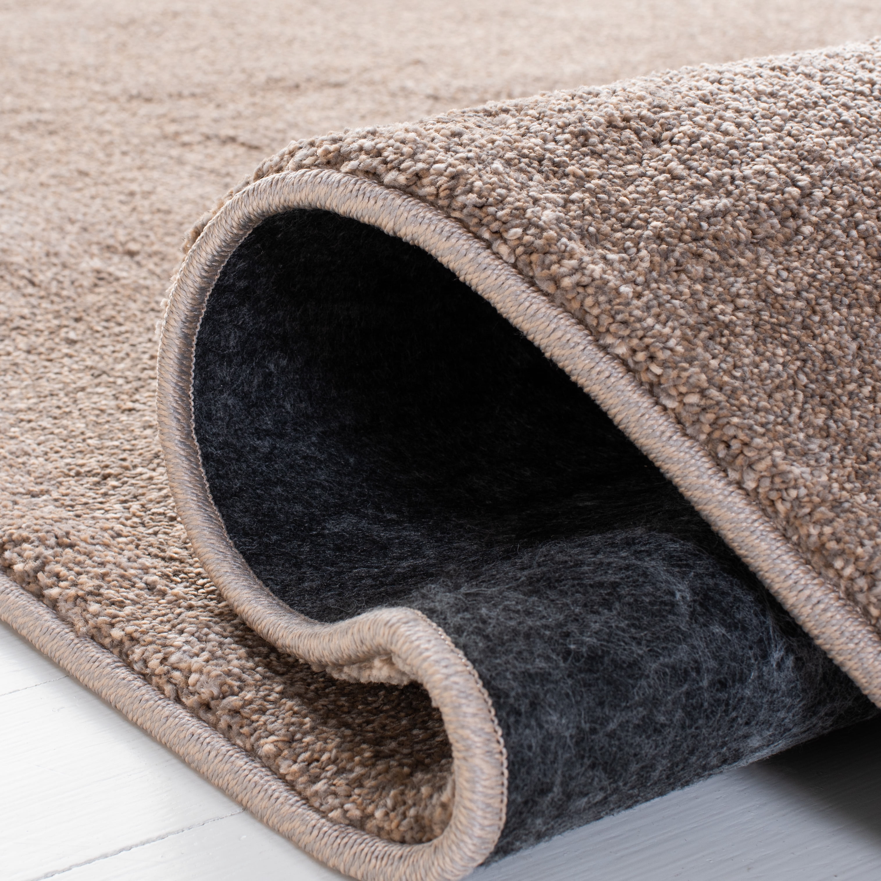SAFAVIEH Plain and Solid Carleen Solid Plush Area Rug, Taupe, 9' x 12'
