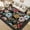 Black, variant on BLEUM CADE Boho Floral Area Rugs for Living Room 5x7, Washable Soft Faux Wool Rug Carpet for Bedroom