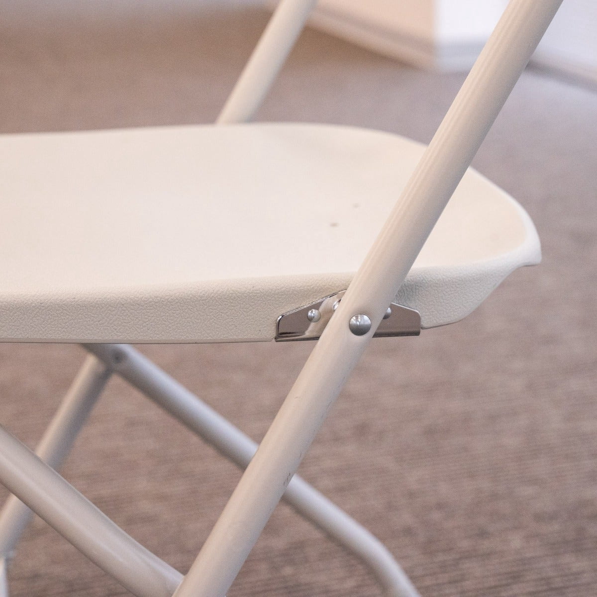 TitanPRO™ Plastic Folding Chair with Drain Holes - White