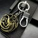 thumbnail image 1 of Llavero de película de tronos, colgante de insignia de cabeza de lobo y dragón, llavero de cuero PU, soporte de llave de coche, accesorios de baratija, regalo, 1 of 4