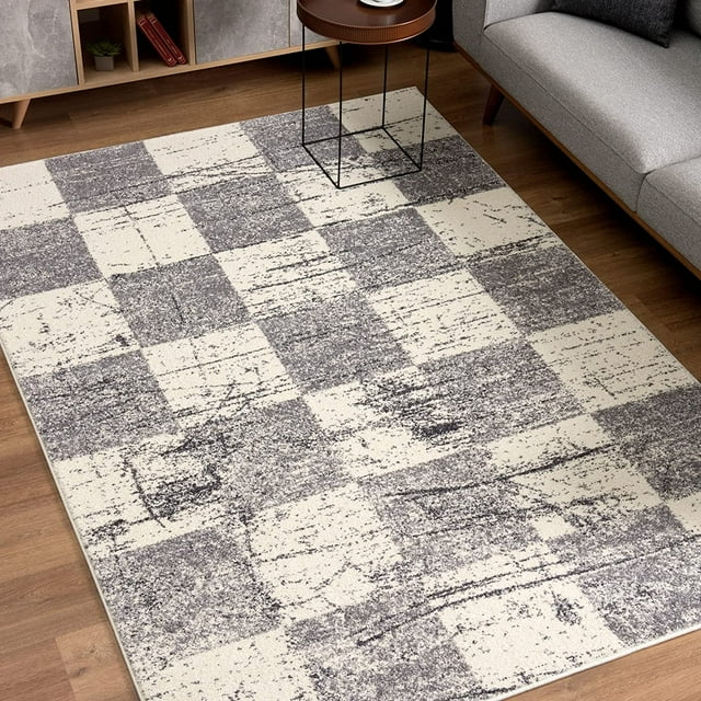 homeroots home decor 390345 5’ x 8’ White and Gray Checkered Area Rug