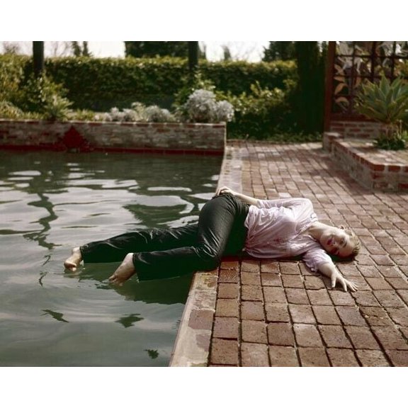 Tuesday Weld ermerges wet fully clothed from her pool lies on deck 8x10 photo