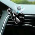 thumbnail image 1 of Difusor de aromaterapia Astronaut con clip de ventilación para coche | Clip de perfume de aspa de ventilador giratorio para interior de automóvil | Adorno decorativo | Incluye 5 palitos de recambio, 1 of 8
